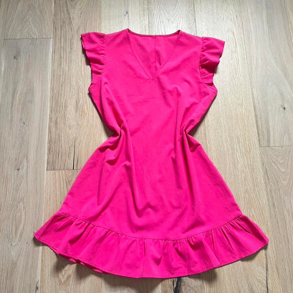 Hot pink Barbie mini dress with ruffle hem and flutter sleeves. Size M